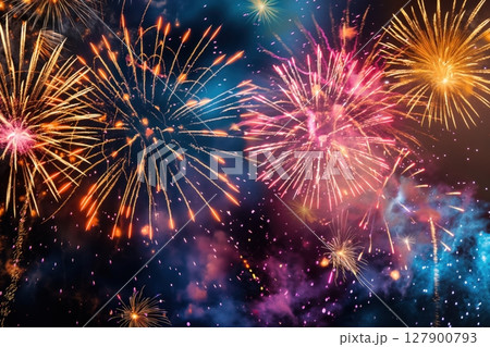 Colorful fireworks exploding in the night sky, creating a festive atmosphere for a celebration 127900793