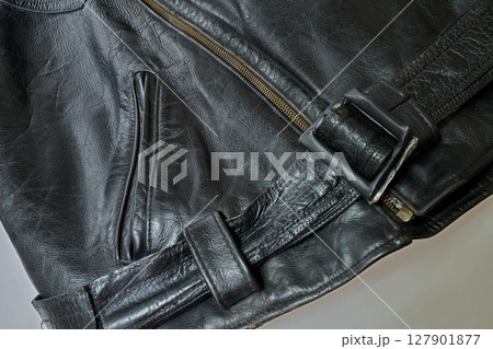 Old and aged black leather perfectoin 127901877