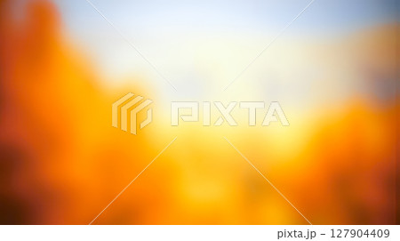 dreamy blurred autumn park background with path and yellow trees, an abstract out of focus image for creative concept dreamy blurred autumn park background with path and yellow trees, an abstract out of focus image for creative concept 127904409