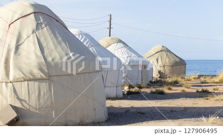 the yurt camp near Issyk kul lake in Kyrgyzstan, the nomadic style in Central Asia 127906495