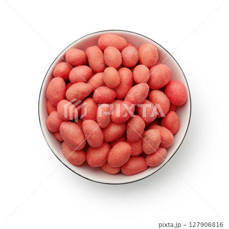 Top view of red spicy coated peanuts in bowl Top view of red spicy coated peanuts in bowl 127906816