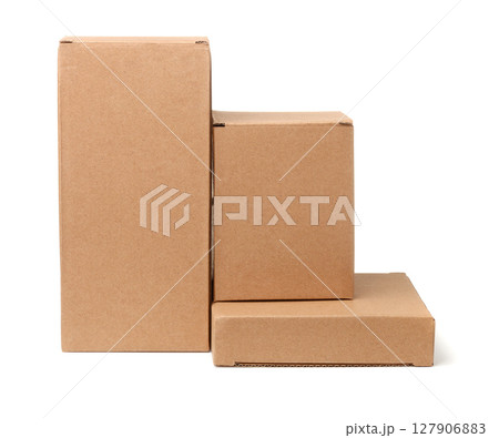 Three different blank brown cardboard boxes Three different blank brown cardboard boxes 127906883
