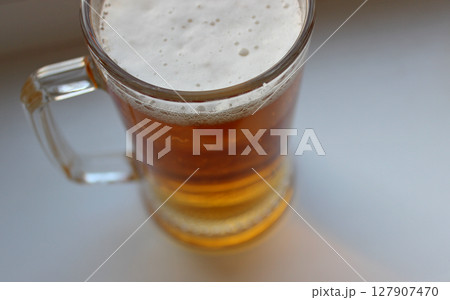 Fragment Of Handle Glass With Cold Craft Lager Beer Isolated On White Top View 127907470