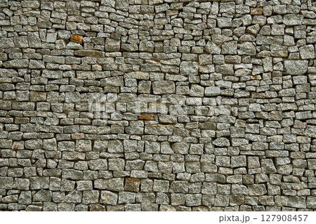 beautiful stone texture on an ancient building 127908457