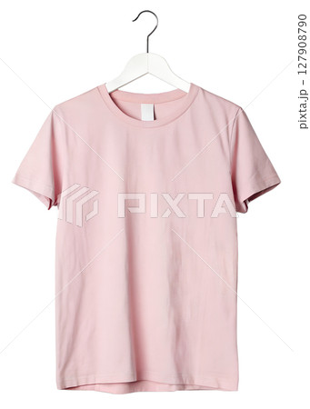 Isolated pink t-shirt on hanger, ready-to-wear casual top, studio shot, neutral apparel for mockup or catalog Isolated pink t-shirt on hanger, ready-to-wear casual top, studio shot, neutral apparel for mockup or catalog 127908790