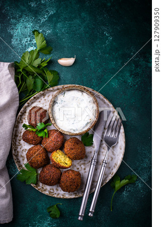 Middle Eastern falafel balls with sauce Middle Eastern falafel balls with sauce 127909350