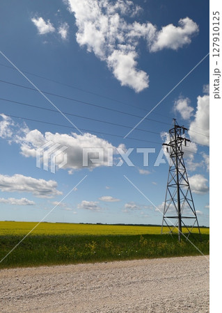 power line tower against blue sky power line tower against blue sky 127910125