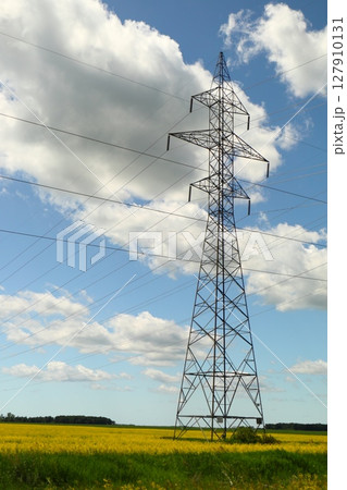 power line tower against blue sky 127910131