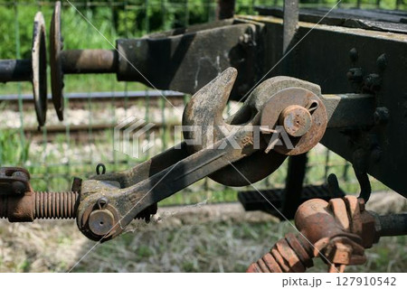 Rusty Train Hook Coupler and Spring Mechanism Detail Rusty Train Hook Coupler and Spring Mechanism Detail 127910542