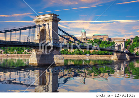 Famous Chain Bridge and Buda castle reflected in Danube River, Budapest, Hungary Famous Chain Bridge and Buda castle reflected in Danube River, Budapest, Hungary 127911018
