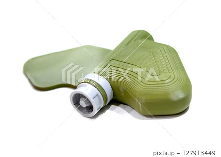 Mina Petal printed on 3D printer isolated on white background. Anti-personnel explosive mine created on 3D printer from molten plastic. Prototype of ammunition printed on 3D printer. Innovation modern 127913449