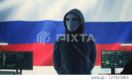 Russian expert working in high tech cyber operations center to collect information through malicious hacking attack. Russian federation spreading fake news and cyberwarfare propaganda. Camera B. Russian expert working in high tech cyber operations center to collect information through malicious hacking attack. Russian federation spreading fake news and cyberwarfare propaganda. Camera B. 127913863