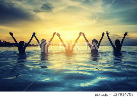 Joyful Family Vacation Moment at Sunset on Summer Beach Adventure in Water 127914708