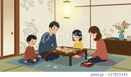 リビングでボードゲームを楽しむ家族、笑顔あふれる休日 127915141