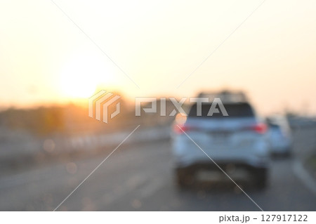 highway traffic with safety barrier on road asphalt, blurred image highway traffic with safety barrier on road asphalt, blurred image 127917122