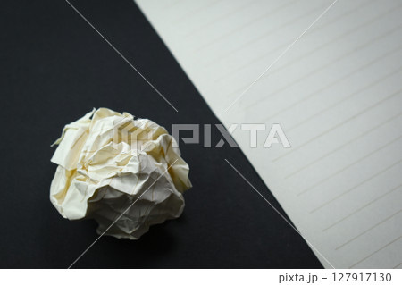 round lump paper and line paper texture on black background,  blank sheet notebook 127917130