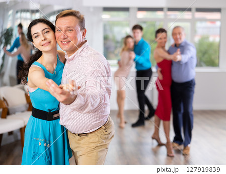 Man and woman dancing 127919839