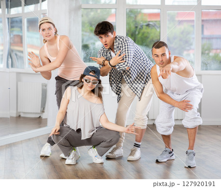 Group of young hip hop dancers posing in dance studio 127920191