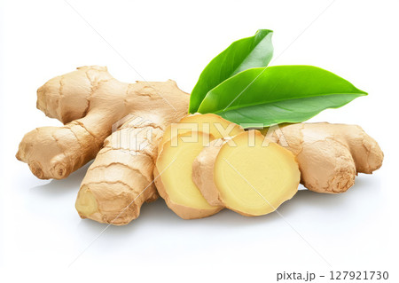 Fresh ginger rhizome with sliced pieces and green leaves, showcasing its natural beauty 127921730