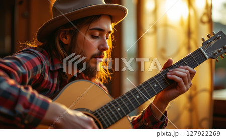Singer songwriter moment captured close up, showcasing musician playing acoustic guitar Singer songwriter moment captured close up, showcasing musician playing acoustic guitar 127922269