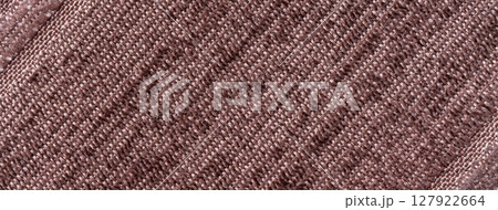 Dark brown knitted textile background with macro texture, diagonal lines and striped fabric pattern. Dark brown knitted textile background with macro texture, diagonal lines and striped fabric pattern. 127922664