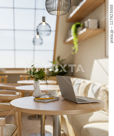 The set of wooden armchairs and sofa with round stool table in cafe corner under large roof window. 127923088