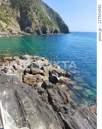 Rocks and sea, mountains, Italy. Nature of Ligurian coast and vacation. Background for design. 127924992