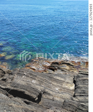 Rocks and sea, mountains, Italy. Nature of Ligurian coast and vacation. Background for design. 127924993
