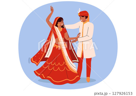 Indian couple dances wedding dance in national clothes, performing traditional rite of hindi culture Indian couple dances wedding dance in national clothes, performing traditional rite of hindi culture 127926153