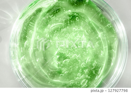 Green cosmetic gel on a white background Green cosmetic gel on a white background 127927798