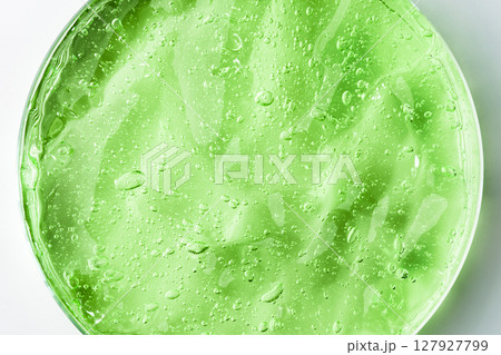 Green cosmetic gel on a white background Green cosmetic gel on a white background 127927799