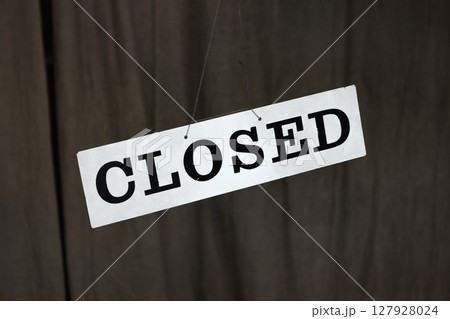 Diagonal CLOSED sign, business shutdown notice for store or office Diagonal CLOSED sign, business shutdown notice for store or office 127928024