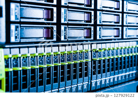 Array of data storage hard drives in internet data center 127929122
