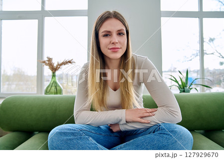 Web cam view of young woman talking looking in camera, online meeting, video call Web cam view of young woman talking looking in camera, online meeting, video call 127929670