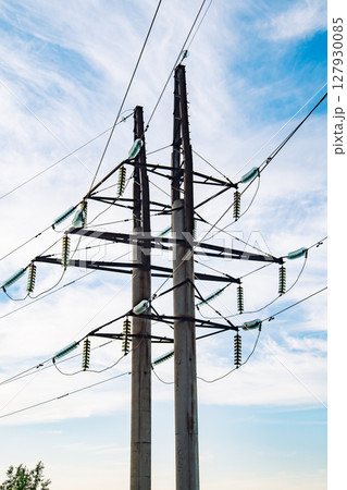 Power lines supplying electricity in Crimea under cloudy sky Power lines supplying electricity in Crimea under cloudy sky 127930085