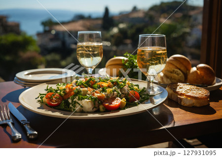 cup of coffee and french croissant on table, balcony with view of beautiful landscape, still life, sea and mountains, resort town, bright day 127931095