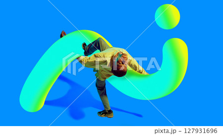 Hip-hop performer interacting with vibrant 3D gradient shape on bright background in dynamic pose Hip-hop performer interacting with vibrant 3D gradient shape on bright background in dynamic pose 127931696