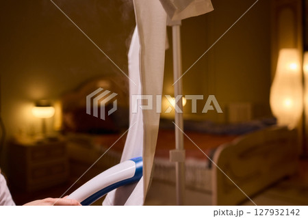 Steam your clothes at home for a fresh and stylish look that's easy to maintain 127932142
