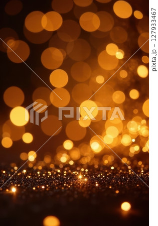 Golden bokeh lights creating a festive and magical atmosphere 127933467
