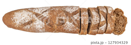 A partially sliced artisanal baguette dusted with flour, revealing a textured, airy crumb and rustic golden crust on a white background 127934329