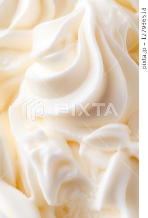 Ice cream texture close up showing intricate patterns, ideal as dessert background 127936518