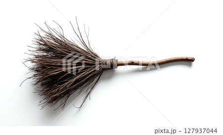 Rustic broom with natural bristles on a white background 127937044