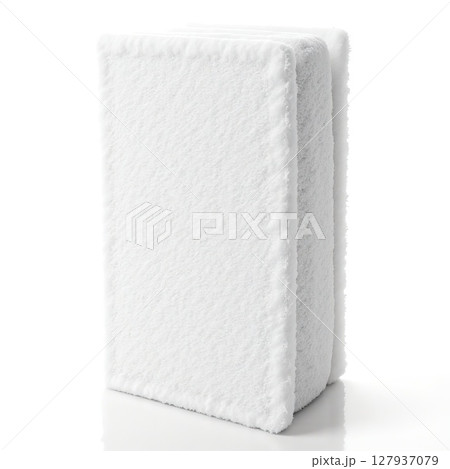 Soft White Towels Stacked Neatly on a Bright Surface for Spa Use Soft White Towels Stacked Neatly on a Bright Surface for Spa Use 127937079