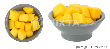 mango diced in ceramic bowl isolated on white background. Top view. Flat lay 127939433