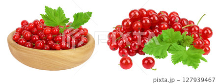 Red currant berries in a wooden bowl isolated on white background 127939467