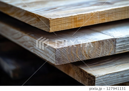 Stacked Wood Planks Showcasing Natural Grain and Texture, Carpentry Materials 127941131
