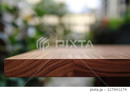 wood table top on blurred green background wood table top on blurred green background 127941274