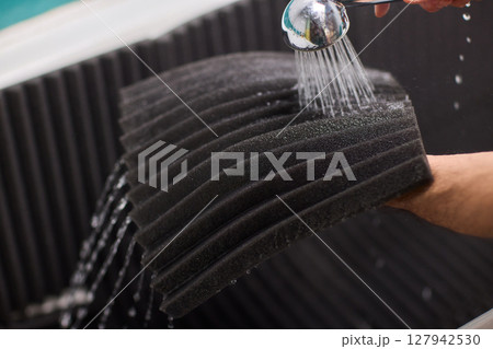 Waterproof Acoustic Foam Panel Designed for Use in a Shower Setting to Enhance Sound 127942530