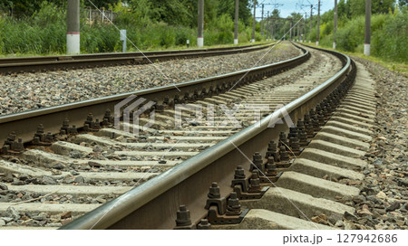 electric train tracks on a bright Sunny day 127942686