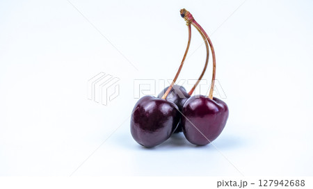 ripe cherries on a white background, macro photo, isolated ripe cherries on a white background, macro photo, isolated 127942688